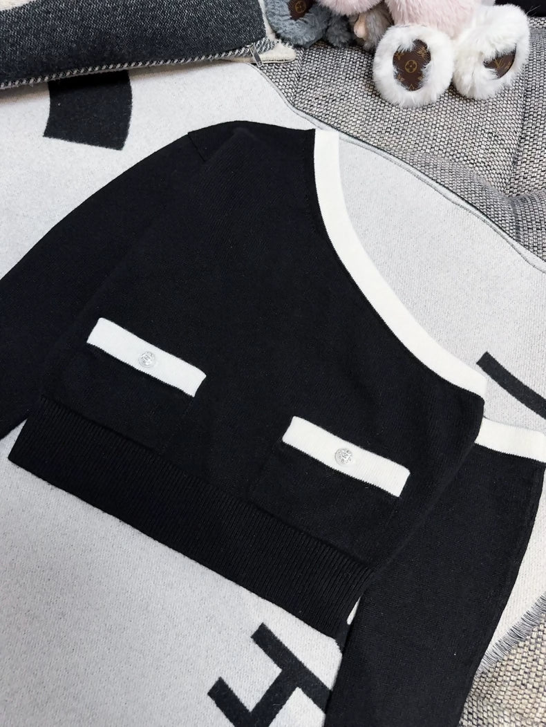 Chanel 23s Black and White Off-the-Shoulder Cashmere Sweater