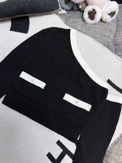 Chanel 23s Black and White Off-the-Shoulder Cashmere Sweater