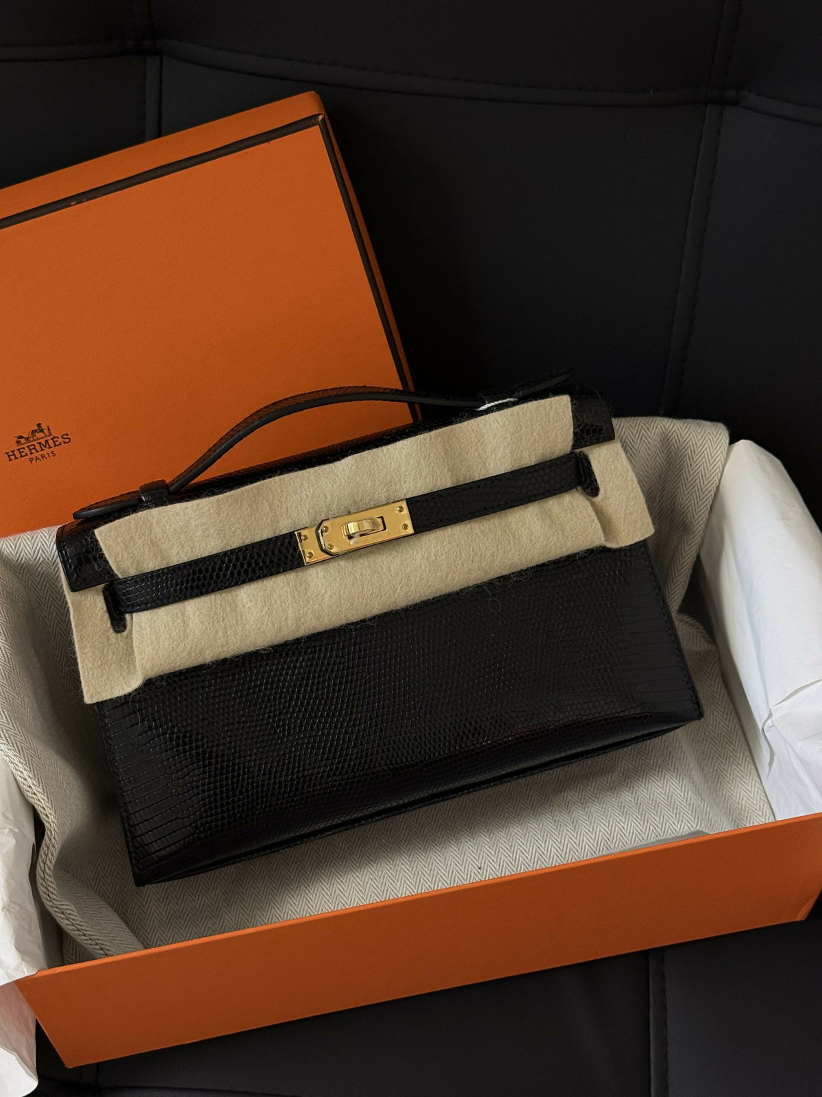 Hermès Kelly pochette Noir / Black Lizard with Gold Hardware