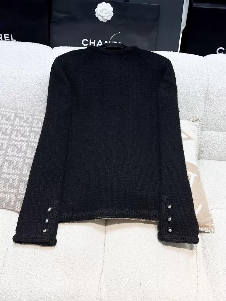 Chanel 23K black tweed jacket
