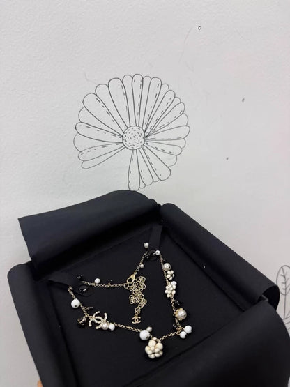 Chanel exquisite black and white enamel floral choker necklace