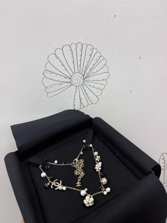 Chanel exquisite black and white enamel floral choker necklace