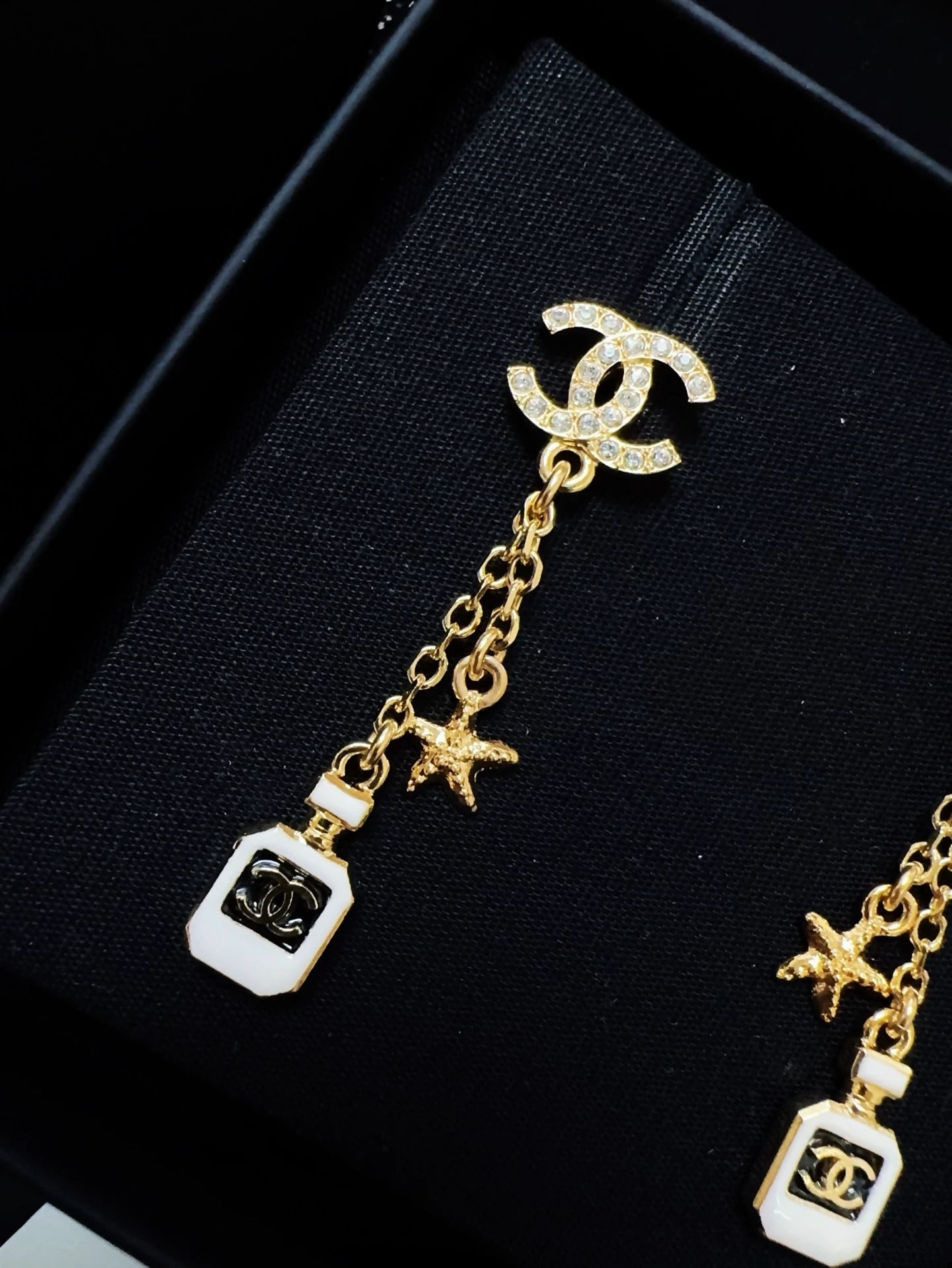 Chanel 25c perfume bottle star earrings