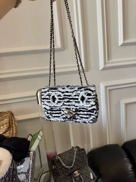 Chanel 24S Mini CF bag in black and white stripes and sequins