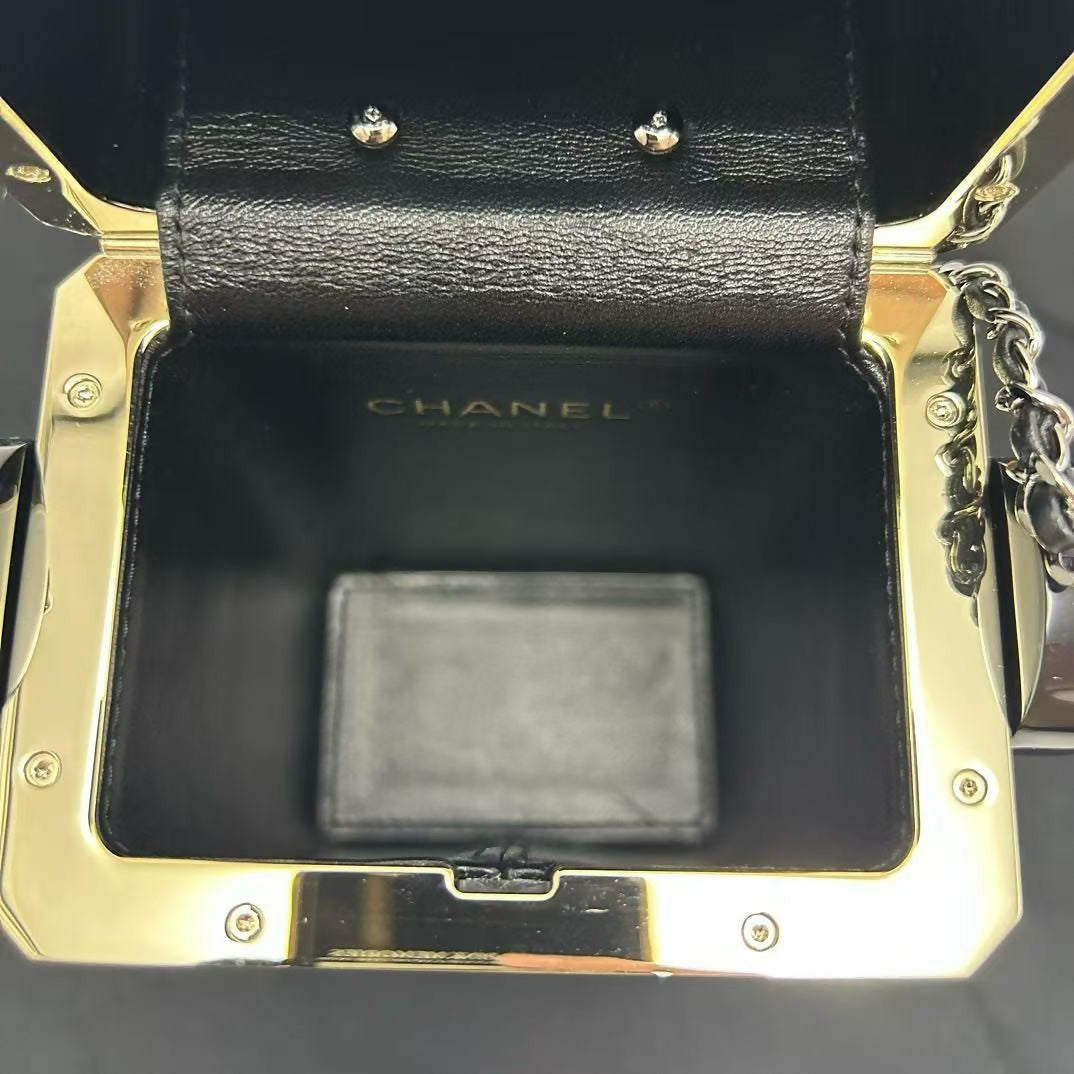 pre-owned chanel limited edition robot minaudière bag black plexiglass and crystals ruthenium hardware