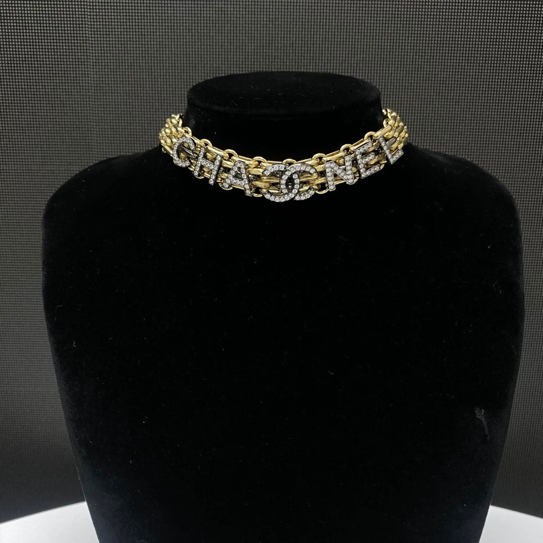 Chanel 21A rhinestone letter chain necklace