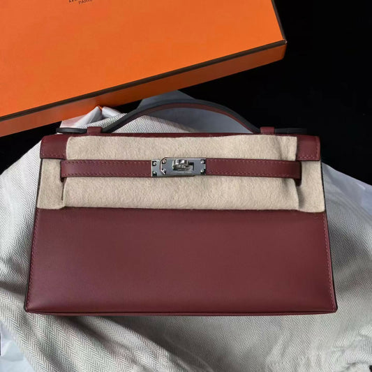 Hermès Kelly Pochette Rouge H Smooth Leather with Palladium Hardware