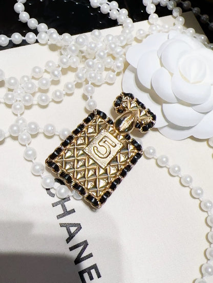 Chanel 23A quilted chain perfume bottle brooch