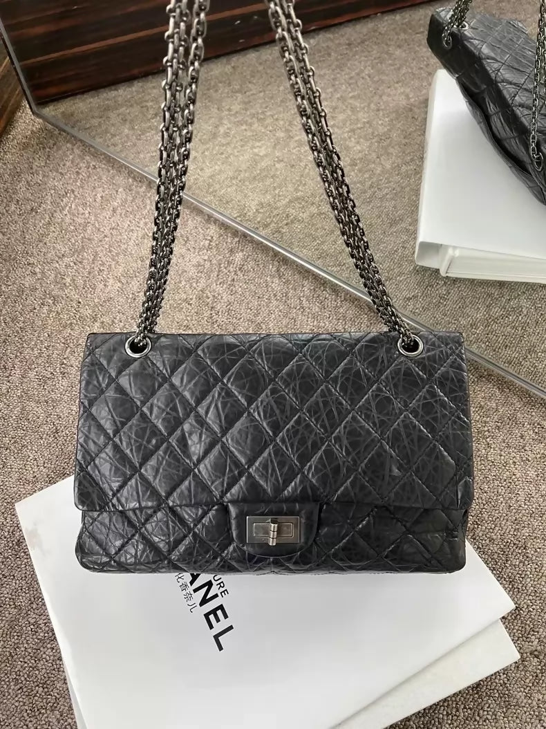 Chanel black and silver Maxi includes dust bag