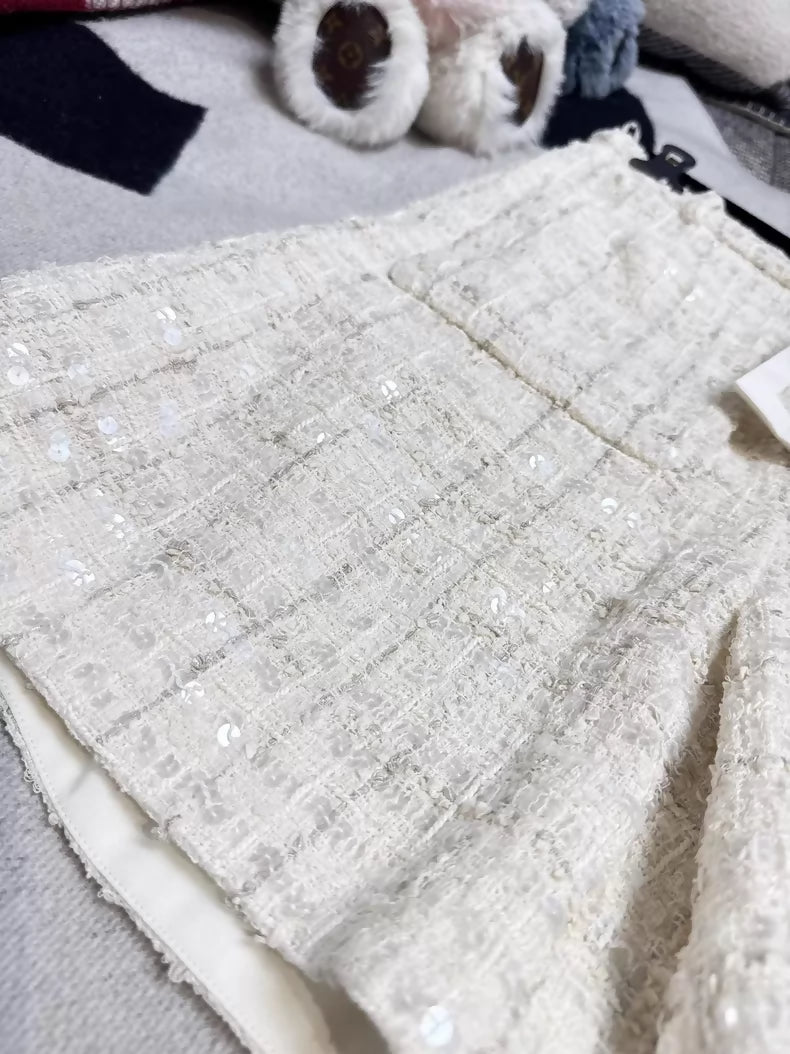 Chanel 25S off-white sequinetweed shorts