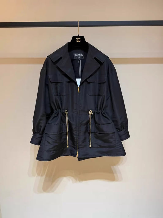 Chanel 23K black trench coat with gold chain details