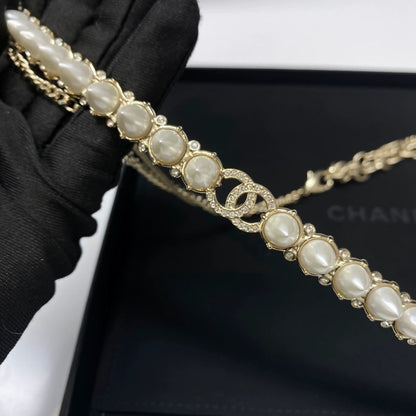 Chanel 22A pearl double C rhinestone waist necklace