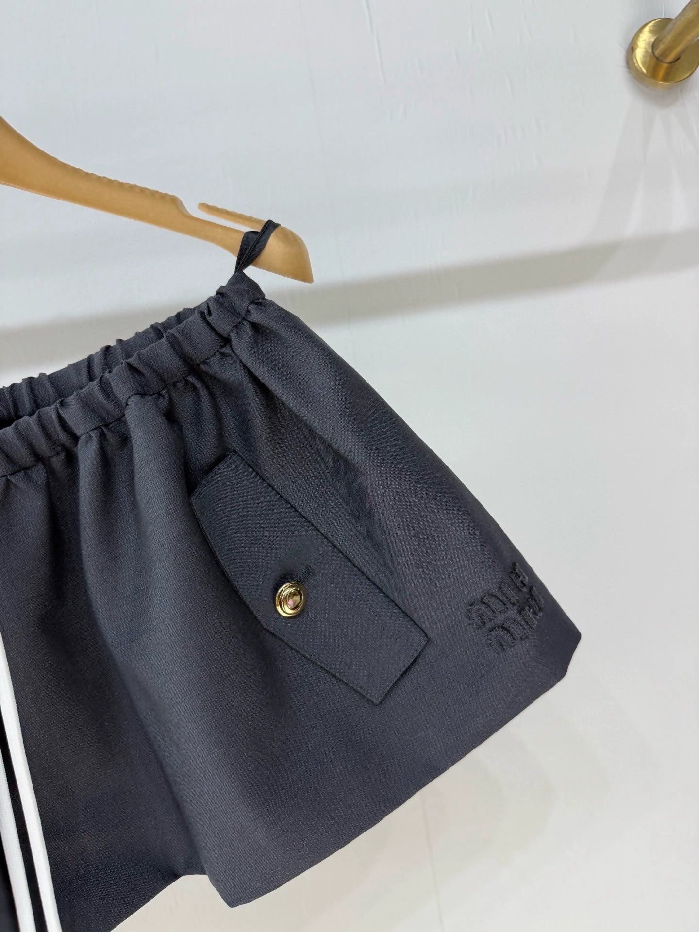 Miumiu 25 autumn and winter new dark blue mini skirt