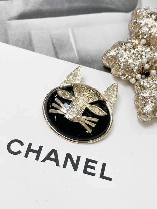 Chanel 19A black and gold double C logo cat brooch