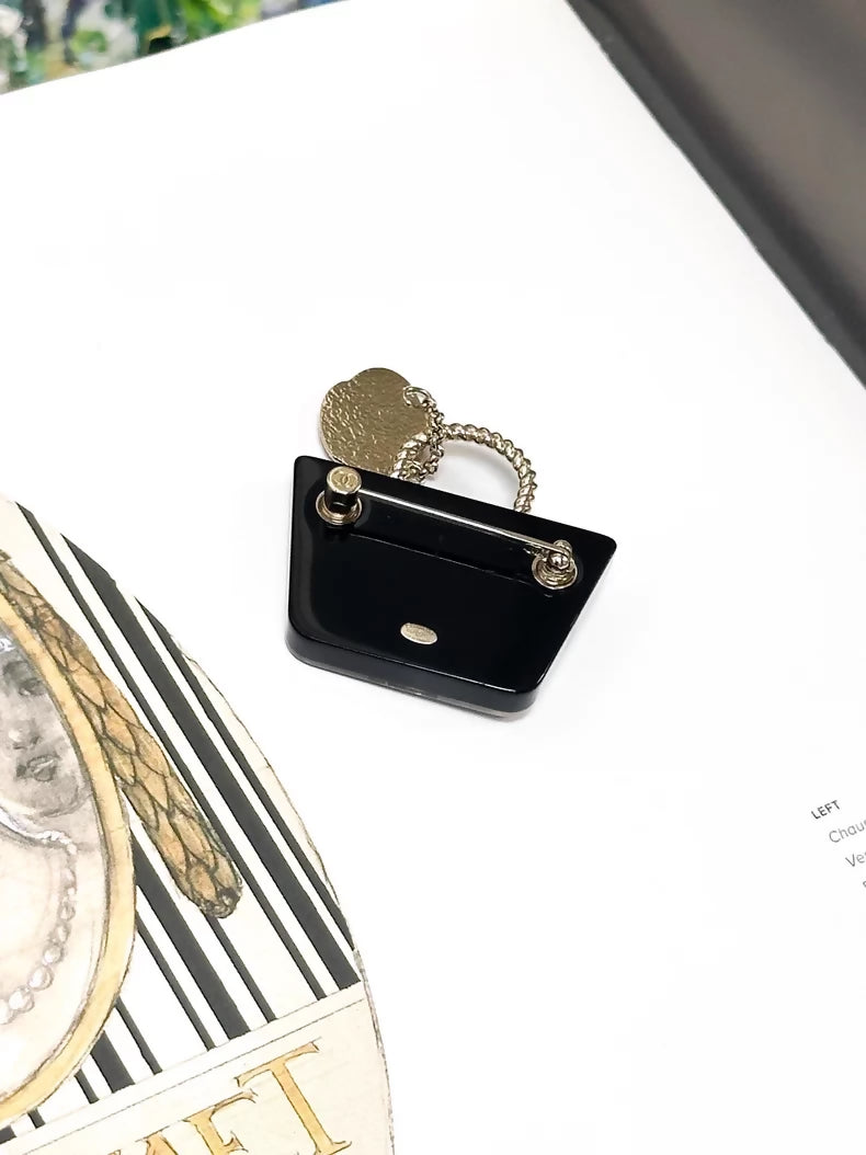 Chanel 21C Early Spring Black Acrylic Handbag Hat-Shaped Brooch