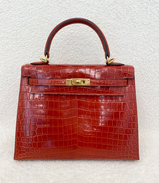 Hermes kelly 25 braise shiny niloticus gold hardware