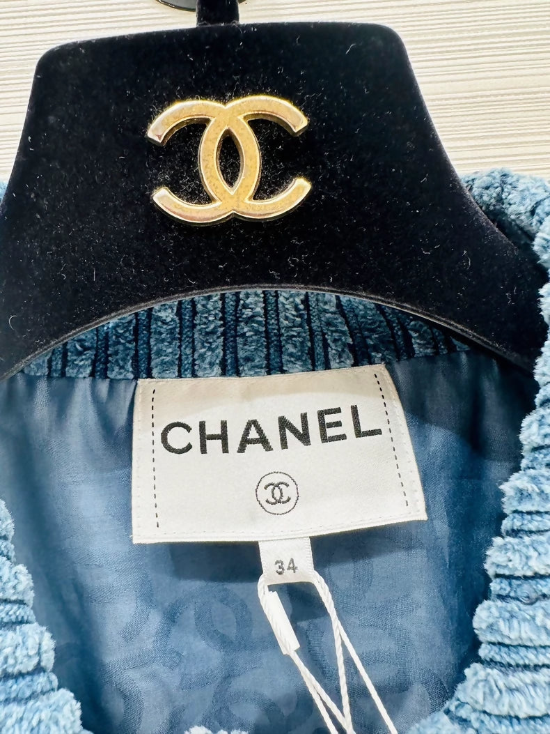 Chanel 25K blue jacket with stripes and sequins