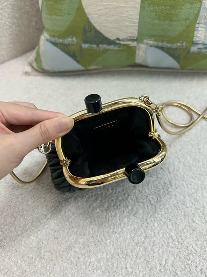 Miu Miu black pleated shell-shaped clip bag