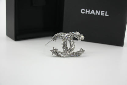 Chanel C21S Rhinestone Metallic Silver Star Twisted Brooch