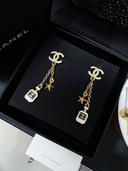 Chanel 25c perfume bottle star earrings