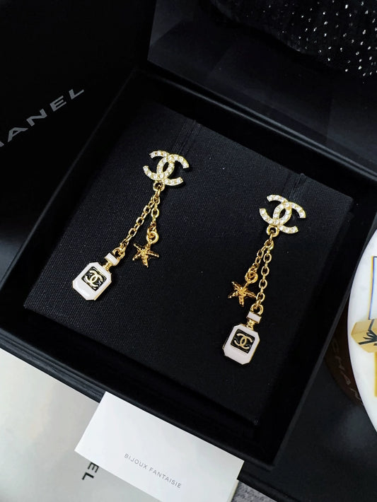 Chanel 25c perfume bottle star earrings