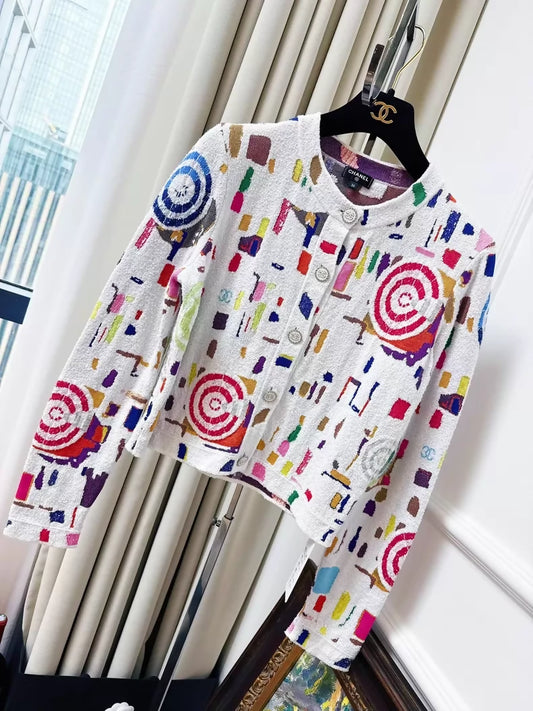 Chanel 19s white cardigan with colourful umbrella patterns
