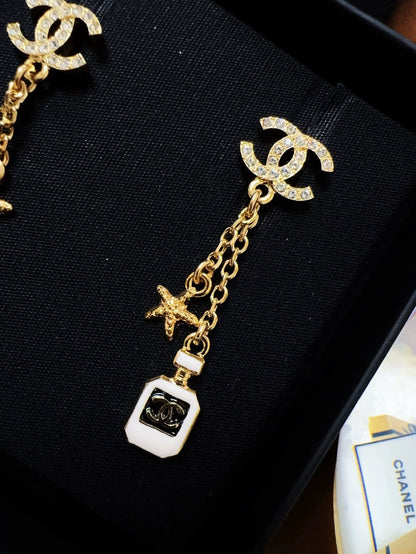 Chanel 25c perfume bottle star earrings