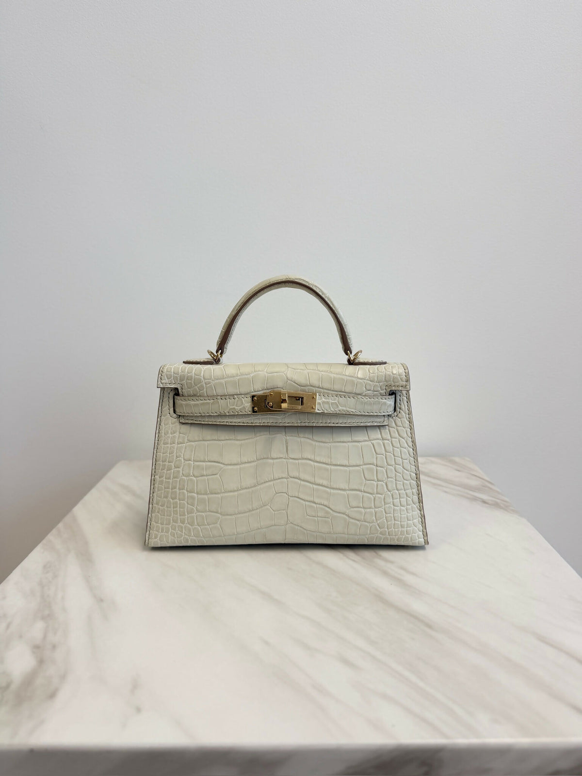 Hermès mini Kelly 20 Beton Matte Permabrass Gold hardware