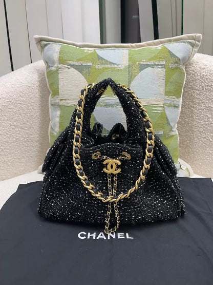 Chanel 25A black sequined tweed 25 bag