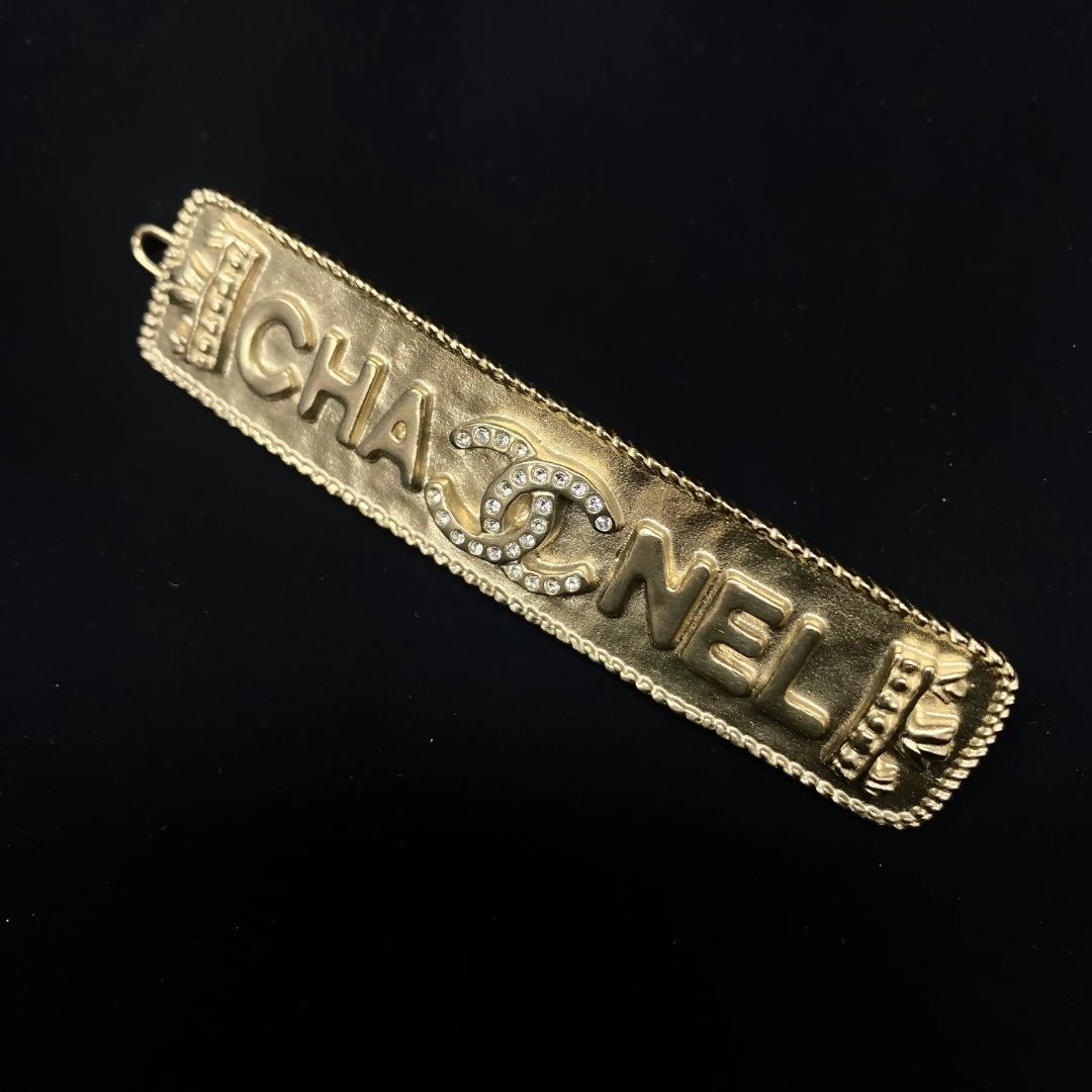Chanel 21F vintage letter hairpin with double C