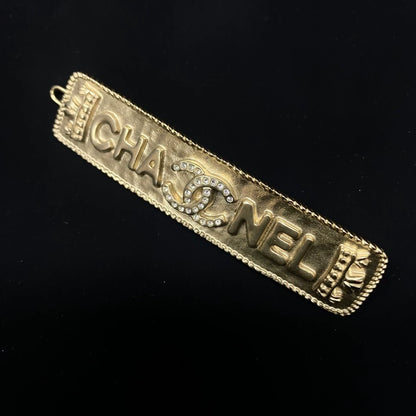 Chanel 21F vintage letter hairpin with double C