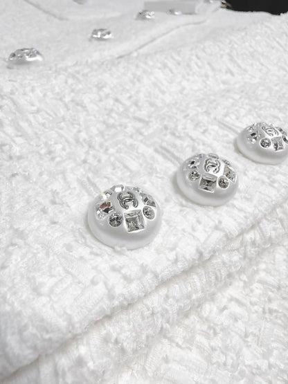 Chanel 23s jacket in white tweed with rhinestone buttons