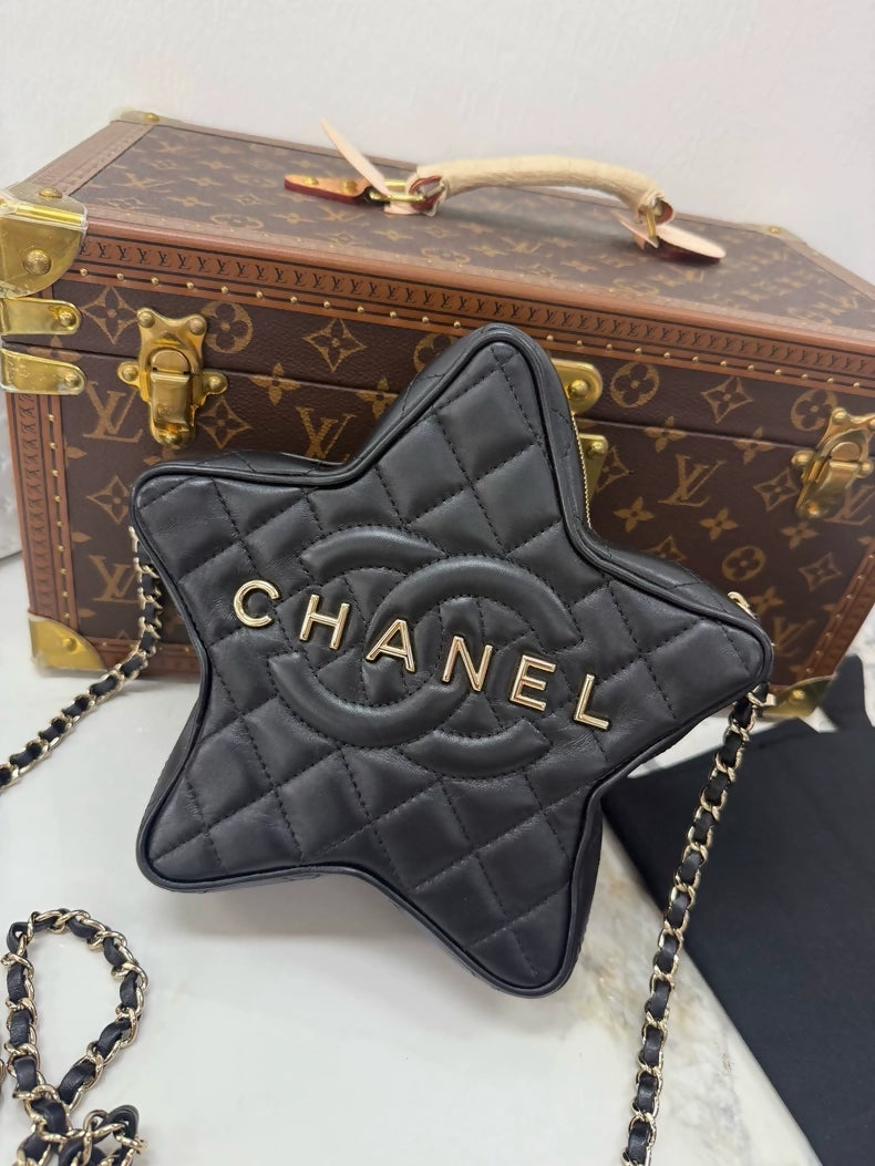 Chanel 24c star bag in black leather gold hardware