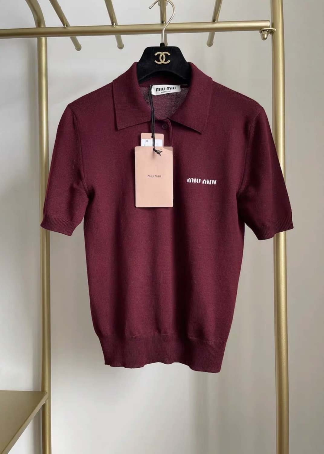 MIU MIU Miu Miu logo-jacquard virgin wool polo shirt - 36 Top - Used fashion item from Wararni