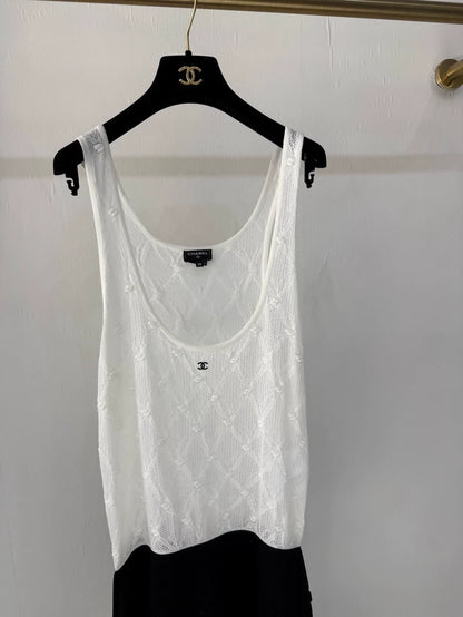 Chanel 24s black and white quilted dress