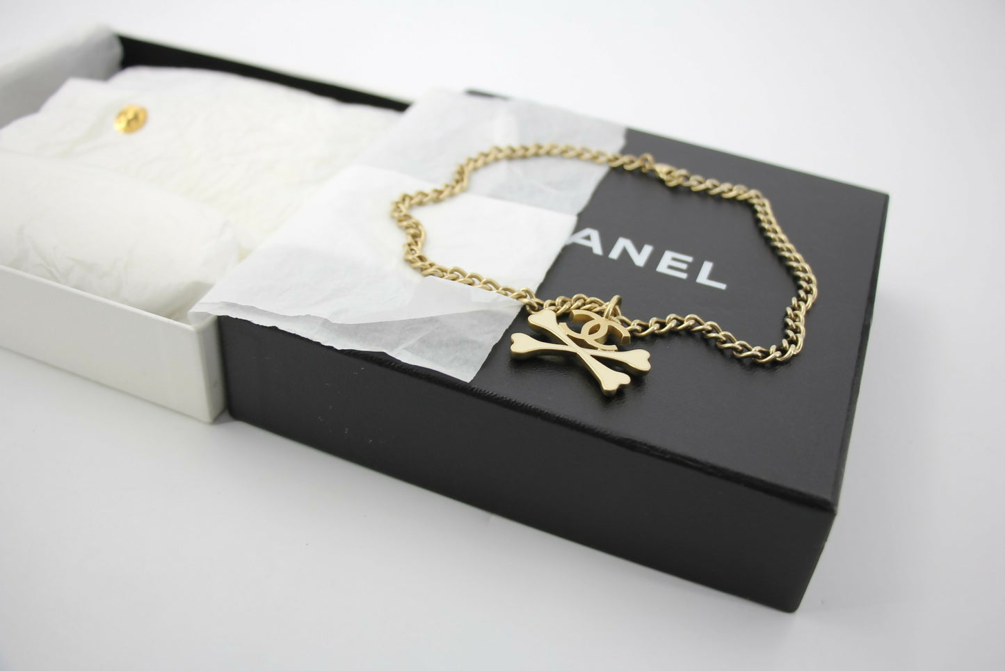 Chanel Vintage 03P Gold-plated CC Enamel White Skull Necklace