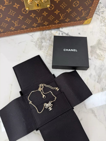 Chanel 25B black bow double C rhinestone pendant necklace