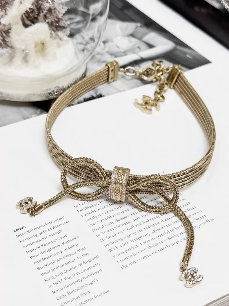 Chanel 2024 Fall/Winter collection gold bow necklace