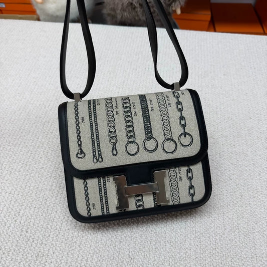 Hermès Constance 24 black leather & grey canvas palladium hardware