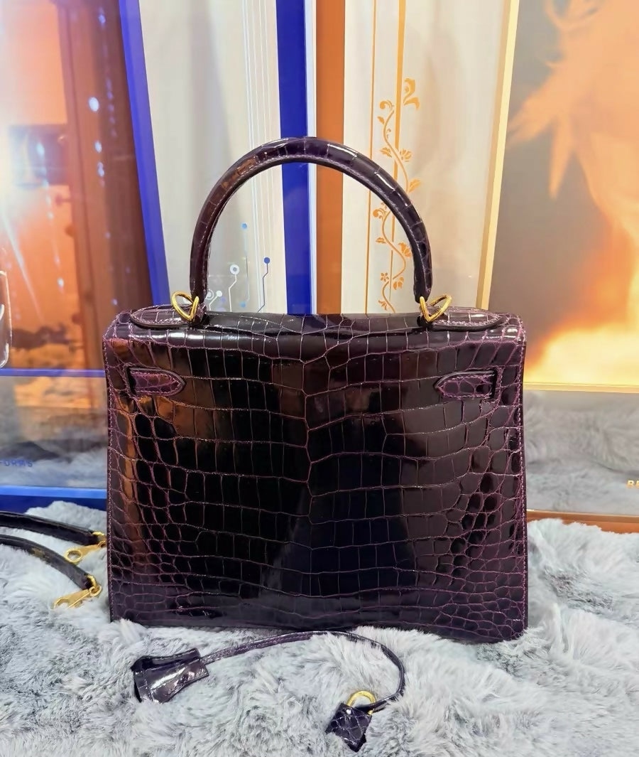 Hermès Kelly 28 Anémone / Raisin Shiny Niloticus Crocodile with Gold Hardware