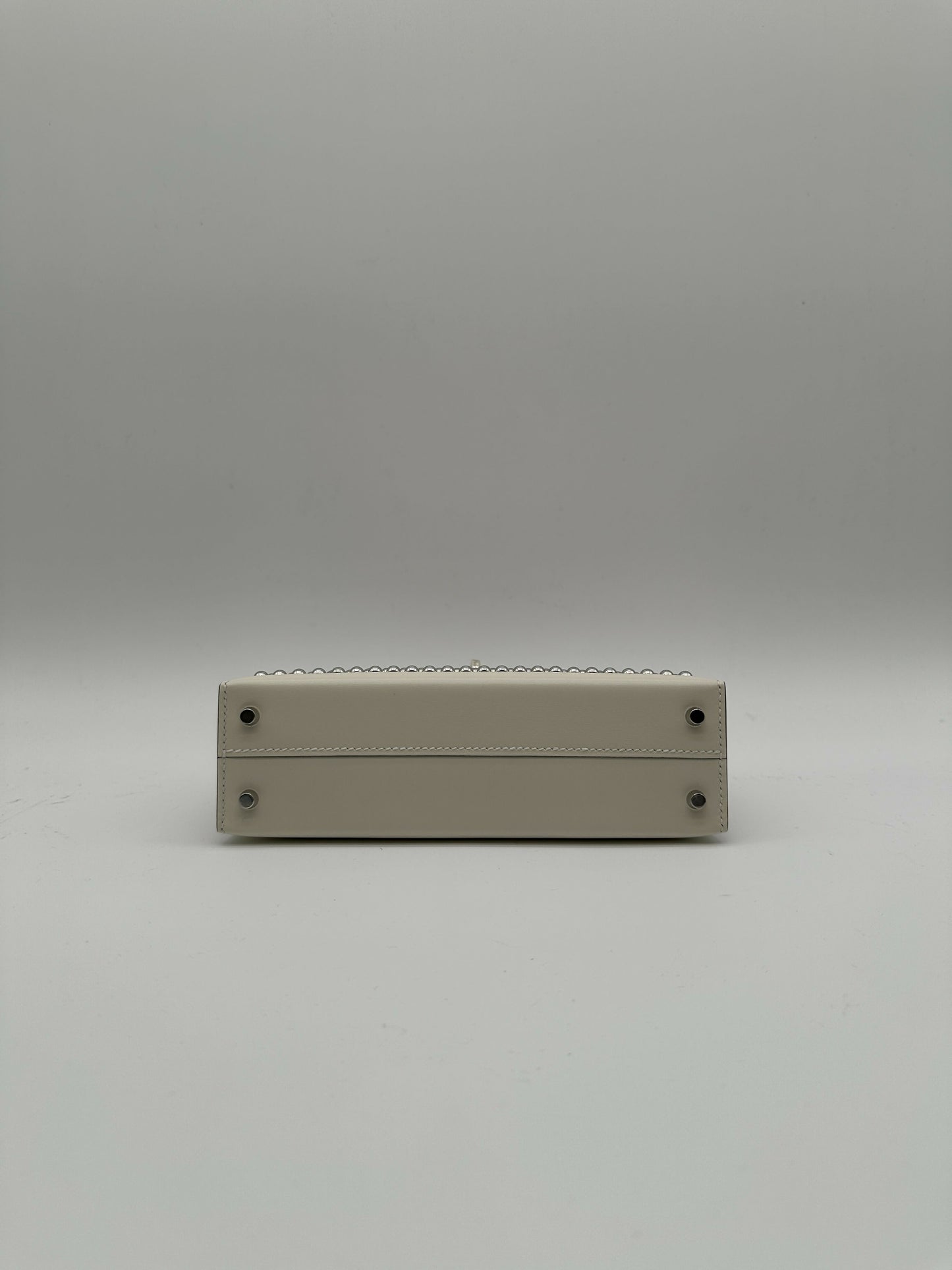 Hermès Kelly 20 Clouté Cream PHW G 2026