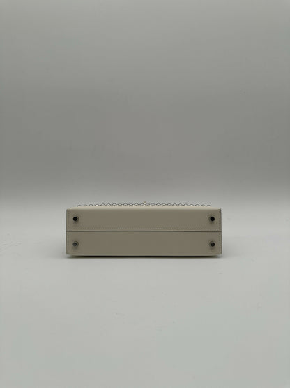 Hermès Kelly 20 Clouté Cream PHW G 2026