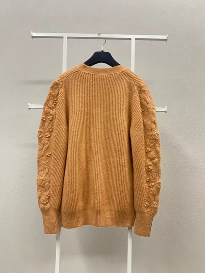 Chanel 21A Castle series orange printed knitted cardigan