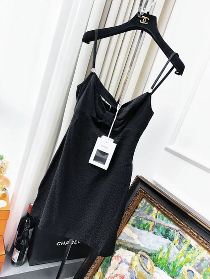 Chanel 21k gold little black dress