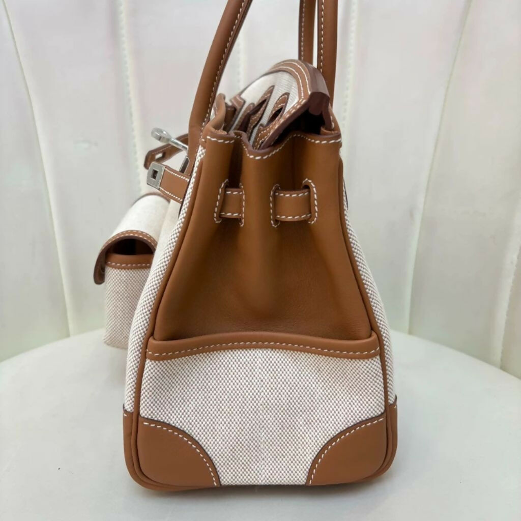 HERMÈS Limited Edition Birkin Cargo 25 in Gold Swift leather and