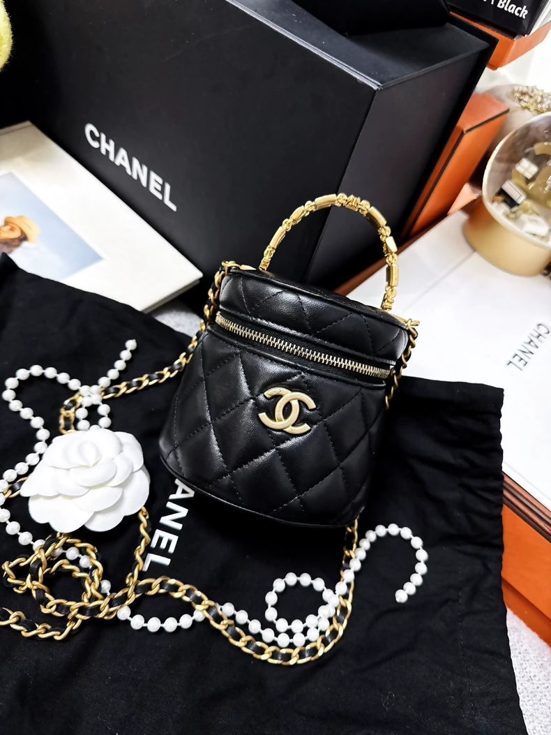 Chanel Fall/Winter 2022 Black quilted enamel mini bag