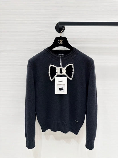 Chanel 25K black bow sweater