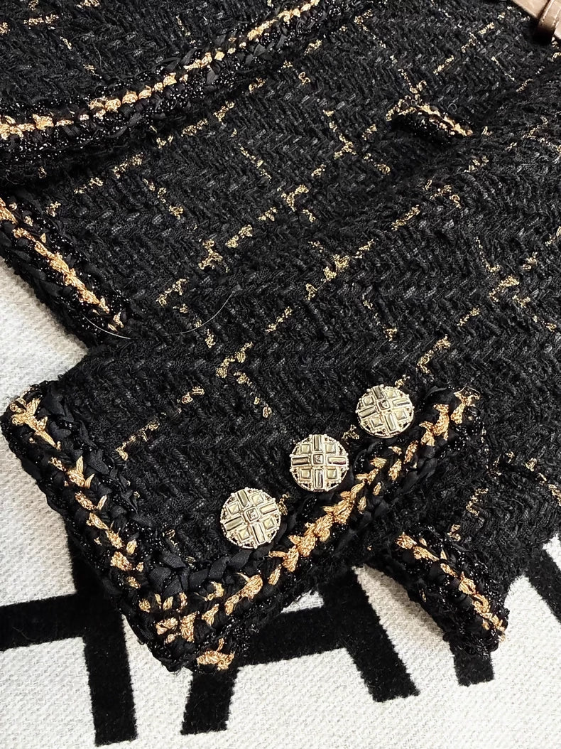 Chanel 16k black and gold tweed and leather jacket
