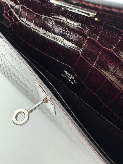 Hermès Kelly Cut Bag in Bordeaux Shiny Porosus Crocodile Leather with PHW