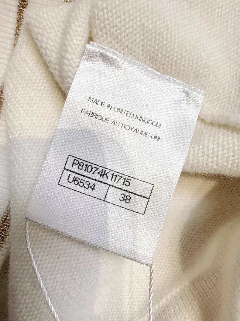 Chanel 26c white knit cardigan with gold trim and two pockets